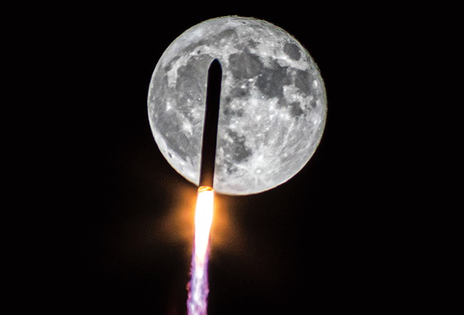 A rocket blasting off with a huge full moon in the background