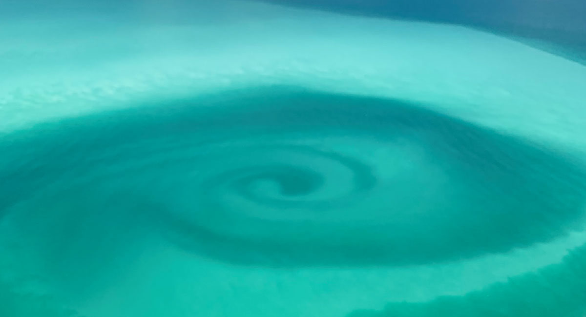 A turquoise spiral swirl