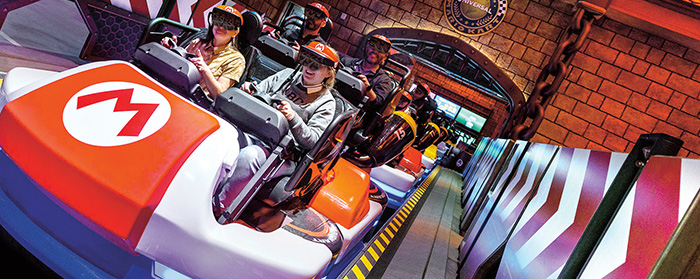 Photo of people on the Bowser ride at Mario theme park