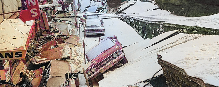 Photo showing the aftermath of an earthquake on a town street