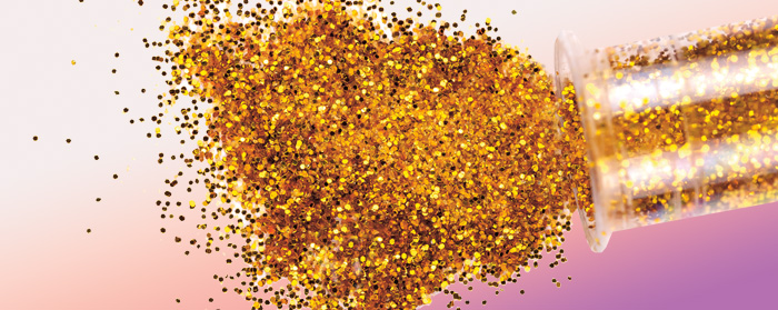 Image of gold glitter being emptied from a tube