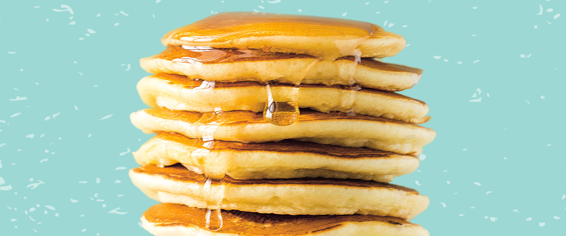 Image of a stack of pancakes with syrup